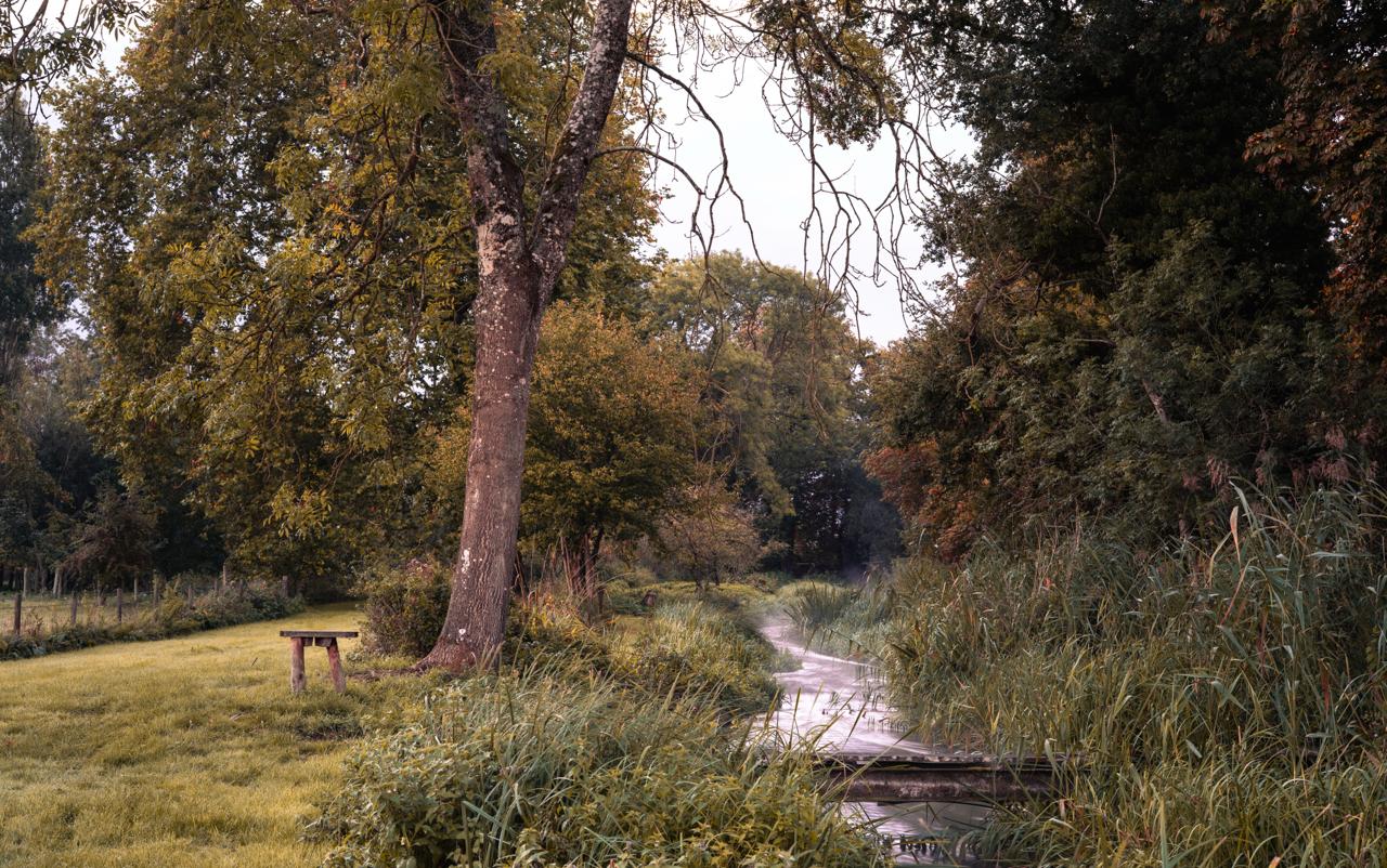 small bridge over the flowing kenner river